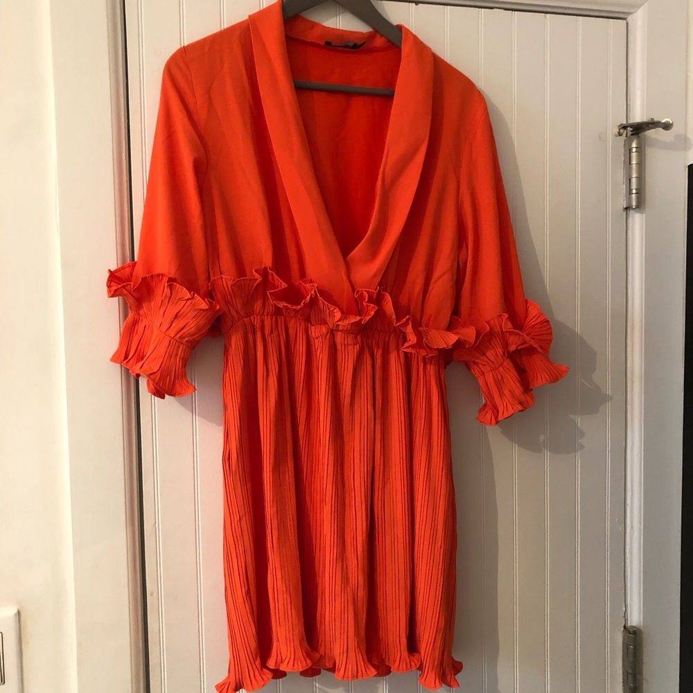 Fun and frilly orange dress